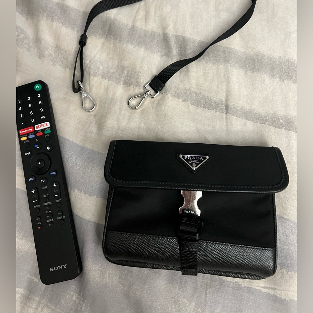Small Prada bag. New, never worn. Unisex
